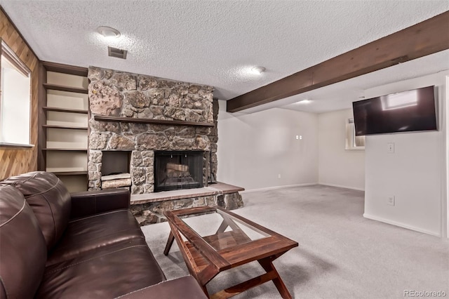 2212 S Naples Way, Aurora, CO 80013 - carpeted living area featuring a textured ceiling and a stone fireplace