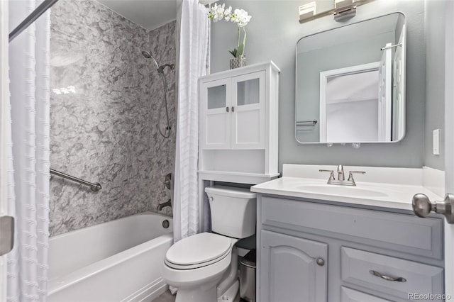 2212 S Naples Way, Aurora, CO 80013 - bathroom featuring shower / bath combo with shower curtain and vanity