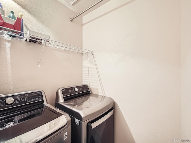 washroom featuring separate washer and dryer