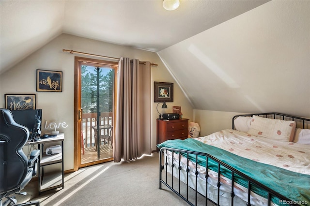 bedroom featuring carpet floors, access to outside, and lofted ceiling