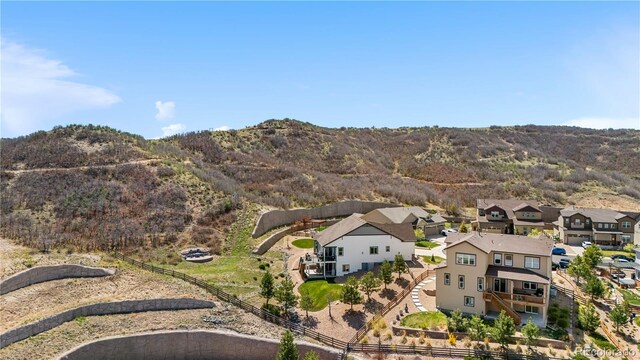 bird's eye view featuring a residential view and a mountain view