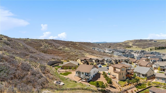 bird's eye view with a residential view and a mountain view