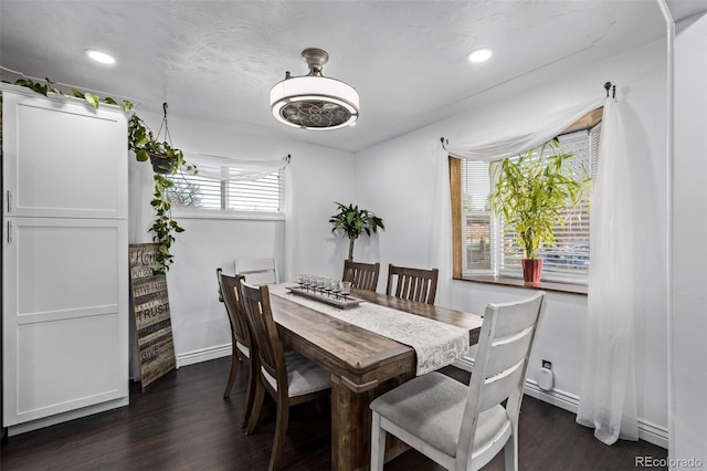 dining area featuring baseboards, recessed lighting, and dark wood-type flooring