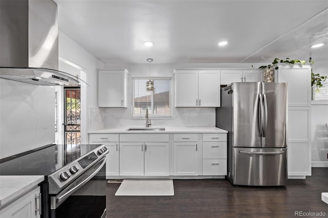 kitchen featuring a sink, appliances with stainless steel finishes, dark wood finished floors, and island range hood