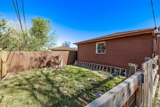 view of yard with fence