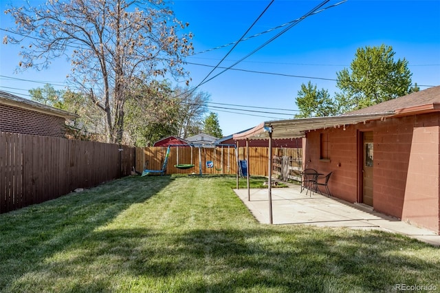view of yard featuring a fenced backyard and a patio area
