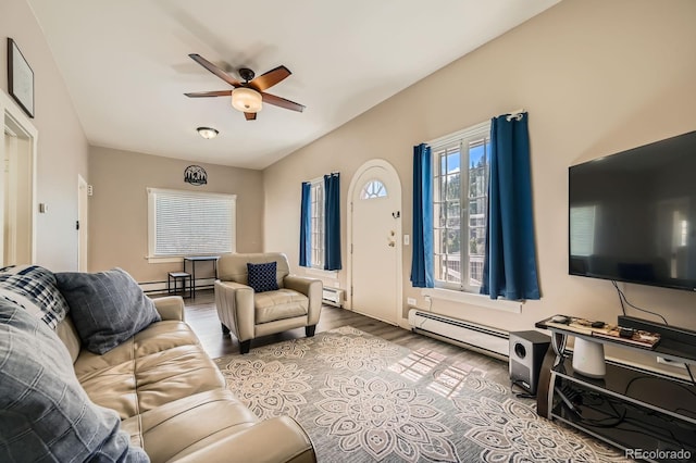 341 High St, Black Hawk, CO 80422 - living area featuring a baseboard radiator, a ceiling fan, and wood finished floors