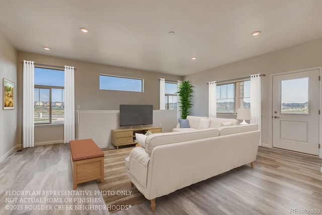 881 W 128th Pl, Westminster, CO 80234 - living area with wood finished floors and recessed lighting