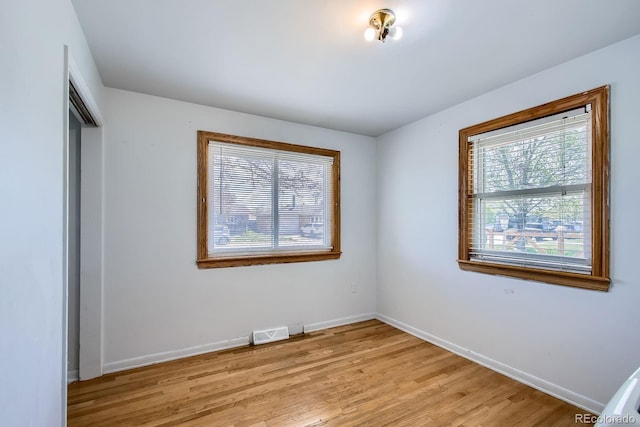 273 S 13th Ave, Brighton, CO 80601 - unfurnished room with baseboards, light wood-style flooring, and visible vents