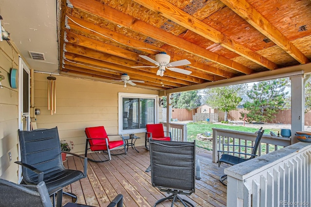 273 S 13th Ave, Brighton, CO 80601 - deck with visible vents, a storage shed, a fenced backyard, a ceiling fan, and an outdoor structure