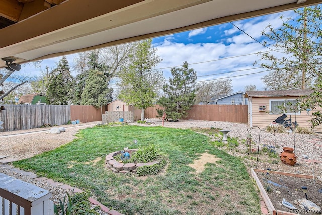 273 S 13th Ave, Brighton, CO 80601 - view of yard with a fenced backyard and an outbuilding