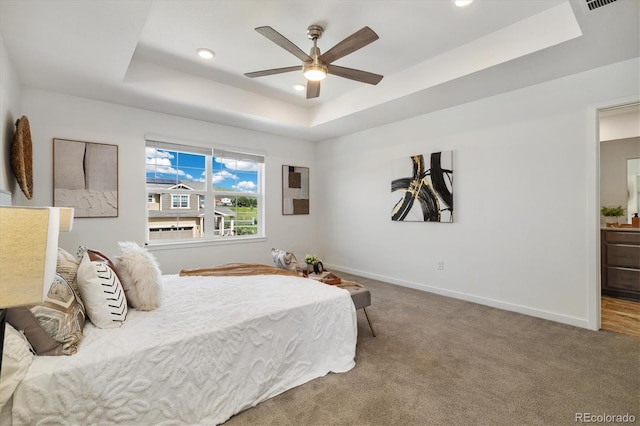 17848 Gallup St, Broomfield, CO 80023 - bedroom with a raised ceiling, carpet floors, recessed lighting, ceiling fan, and ensuite bath