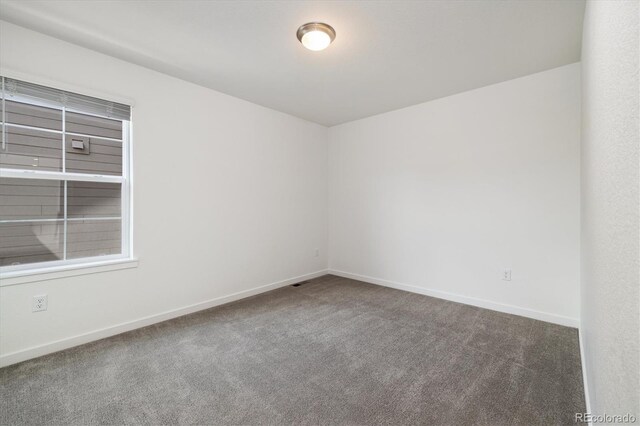 17848 Gallup St, Broomfield, CO 80023 - carpeted empty room with baseboards