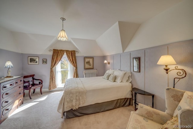 carpeted bedroom featuring vaulted ceiling