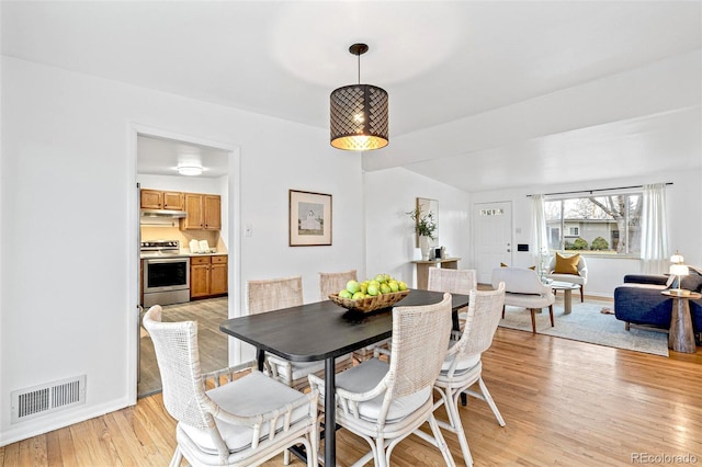 dining room featuring light hardwood / wood-style flooring