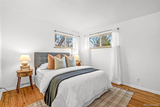 bedroom featuring wood-type flooring