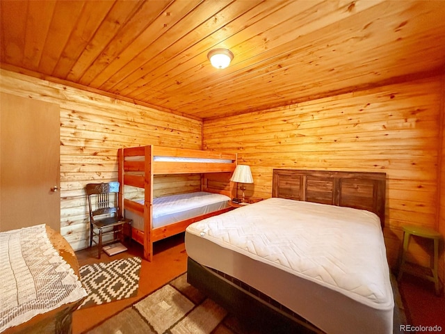 bedroom with wooden walls and wooden ceiling