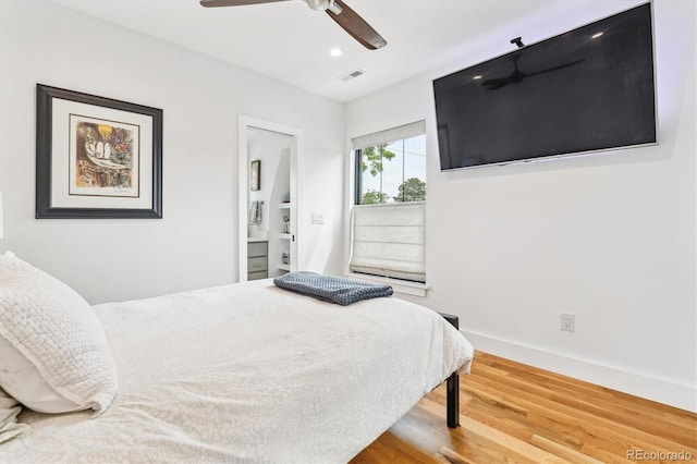 1690 Spruce St, Denver, CO 80220 - bedroom with wood finished floors, baseboards, ensuite bathroom, ceiling fan, and recessed lighting