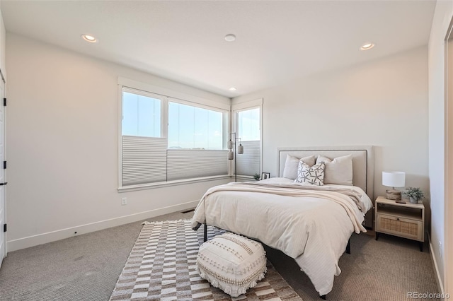 carpeted bedroom with recessed lighting and baseboards