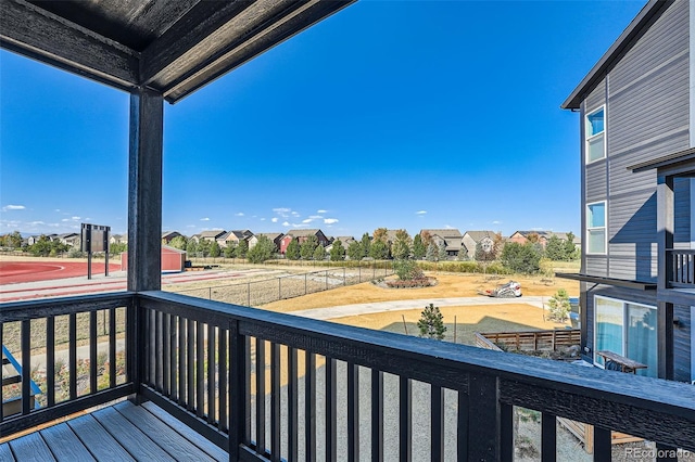 wooden deck featuring a residential view