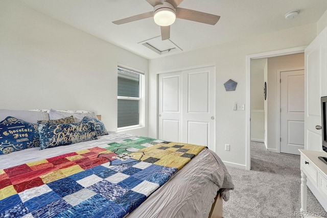 bedroom featuring ceiling fan, carpet floors, baseboards, a closet, and attic access