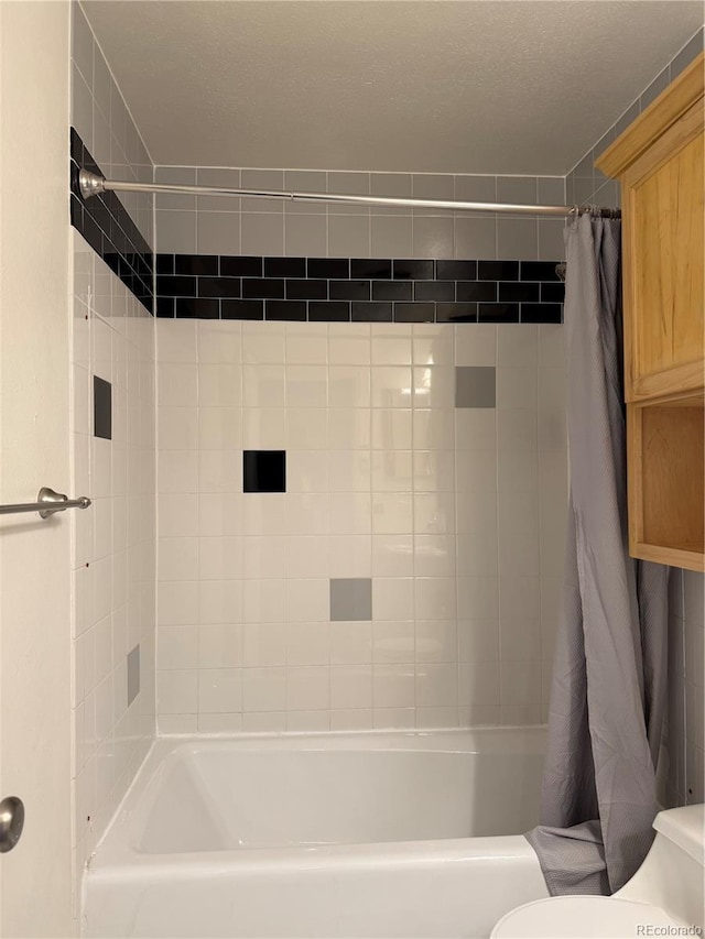 1796 S Yampa Way, Aurora, CO 80017 - bathroom featuring toilet and shower / bath combo