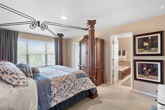 9290 Melborne Ct, Parker, CO 80134 - bedroom with light colored carpet, baseboards, and ensuite bathroom