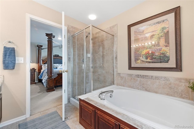 9290 Melborne Ct, Parker, CO 80134 - bathroom with connected bathroom, a bath, a stall shower, and tile patterned flooring