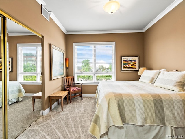 400 E 3rd Ave Unit 305, Denver, CO 80203 - bedroom with baseboards, carpet flooring, ornamental molding, and a closet