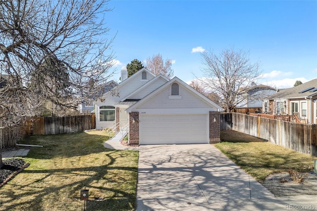 4493 Dunkirk Way, Denver, CO 80249 - traditional-style home with brick siding, concrete driveway, a chimney, and an attached garage