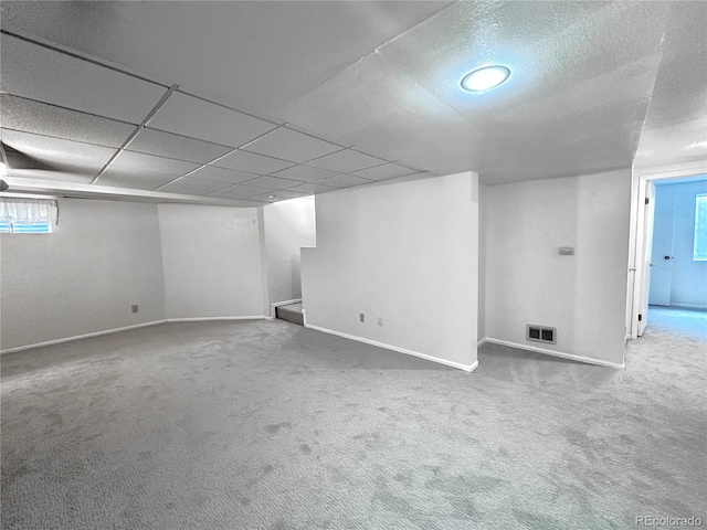 4493 Dunkirk Way, Denver, CO 80249 - basement featuring carpet and baseboards
