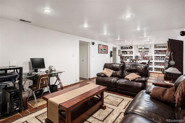 living room featuring built in features