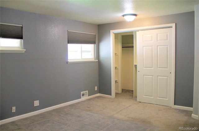7891 Poplar St, Commerce City, CO 80022 - unfurnished bedroom featuring a closet and carpet flooring