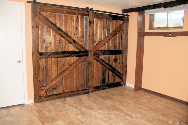 7891 Poplar St, Commerce City, CO 80022 - detailed view of a barn door and a gate