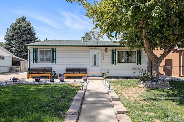 7891 Poplar St, Commerce City, CO 80022 - view of front of house featuring roof with shingles