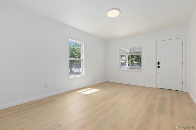 interior space with plenty of natural light and light wood-type flooring