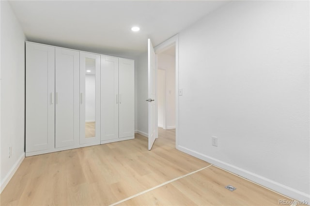 unfurnished bedroom featuring light hardwood / wood-style floors