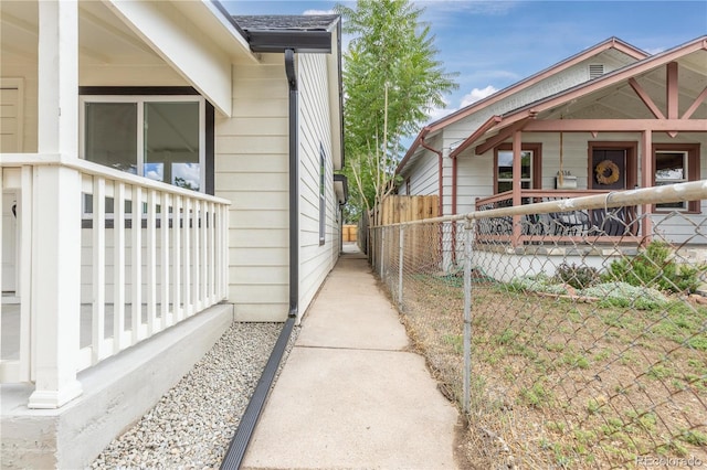 view of home's exterior featuring covered porch