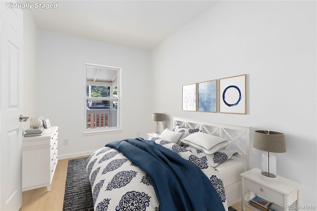 bedroom with light wood-type flooring