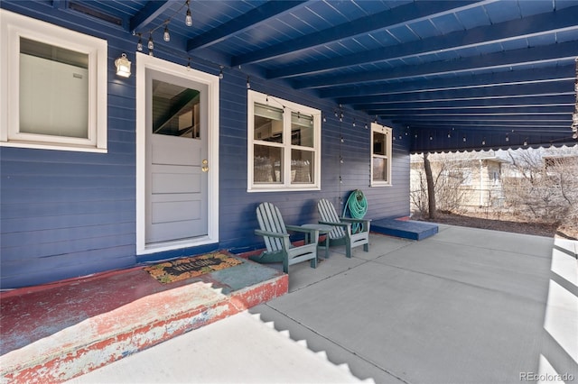 view of patio featuring a porch