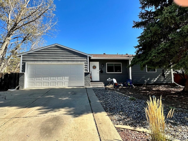 single story home featuring a garage