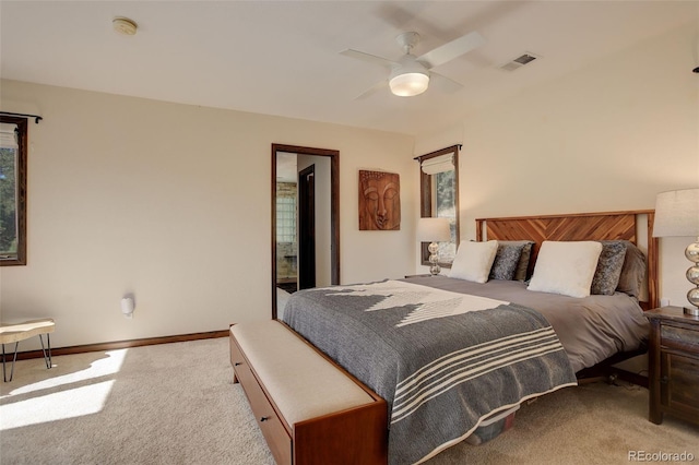 bedroom featuring ceiling fan and light colored carpet