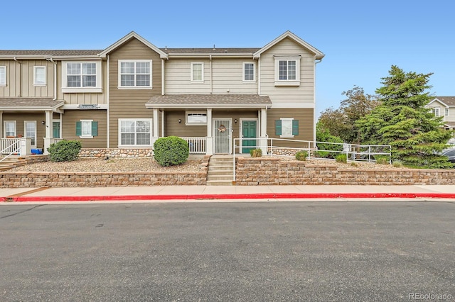 14700 E 104th Ave Unit 2802, Commerce City, CO 80022 - view of property featuring a porch