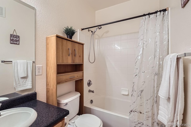 14700 E 104th Ave Unit 2802, Commerce City, CO 80022 - bathroom featuring vanity, shower / bath combo, a textured wall, and toilet