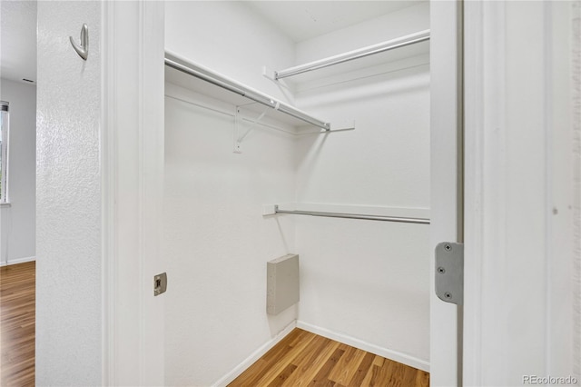 5255 Memphis St Unit 317, Denver, CO 80239 - spacious closet featuring wood finished floors