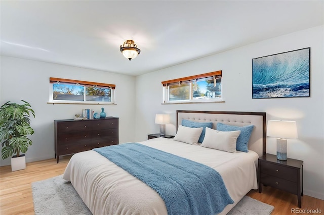 bedroom featuring wood finished floors