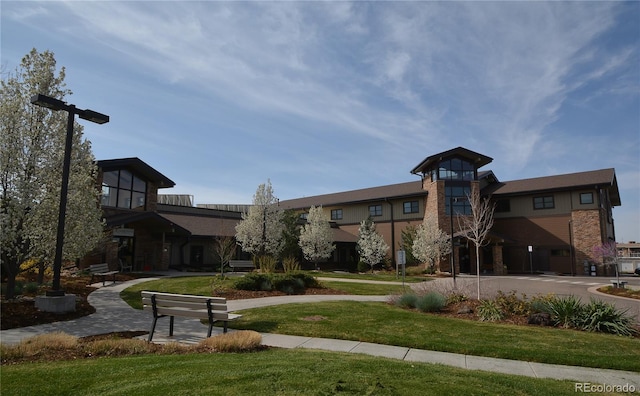 view of community with a yard