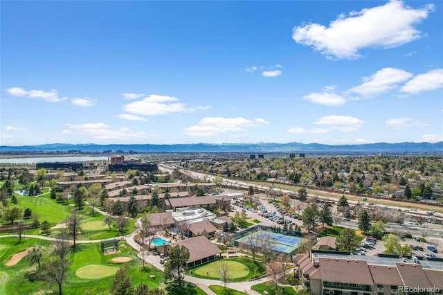 birds eye view of property featuring a mountain view and view of golf course
