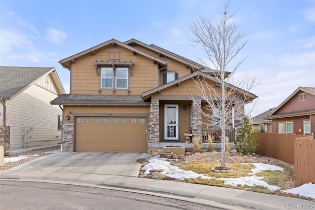 craftsman inspired home with a garage and a porch