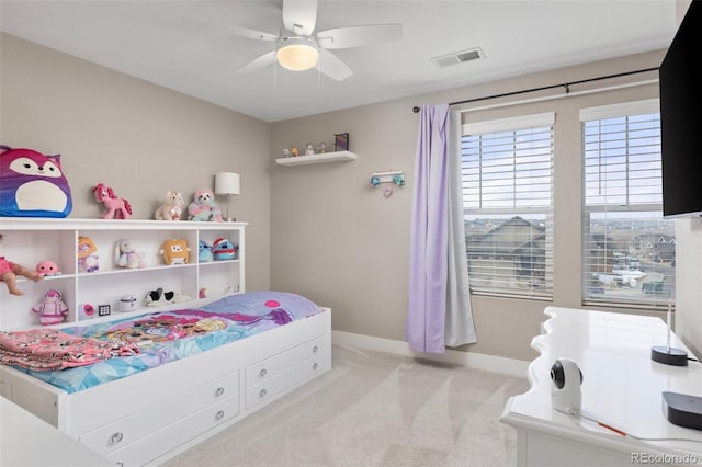 carpeted bedroom with ceiling fan